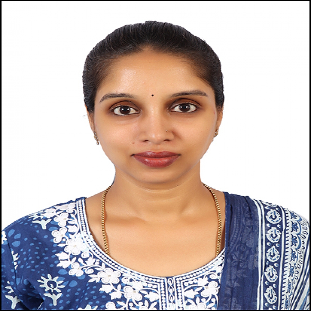 Veena B